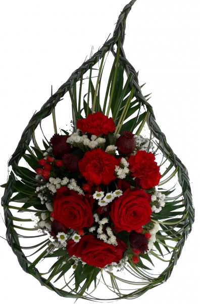 Grabgesteck zur Urnenbeisetzung mit frischen roten Rosen